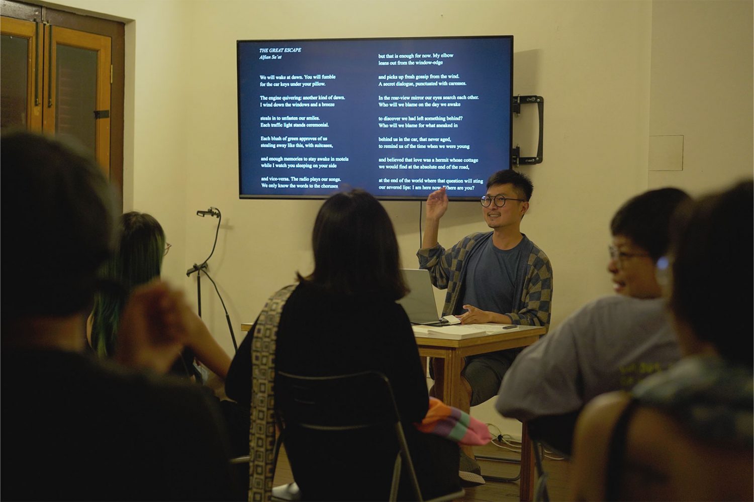 Wei Keong sharing about his works at an artist talk.