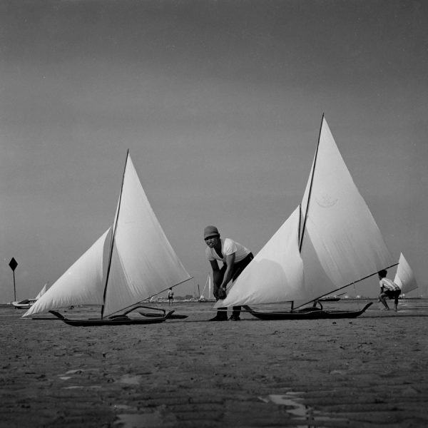 Time and Tide by Foo Tee Jun - Man prepares sailboats for Kolek Lumba, c. 1960s