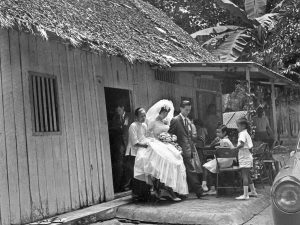 Time and Tide by Foo Tee Jun - Wedding in kampung, c. 1960s