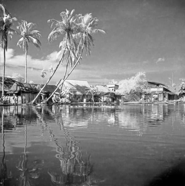 Time and Tide by Foo Tee Jun - Kampung at Potong Pasir, c. 1970s