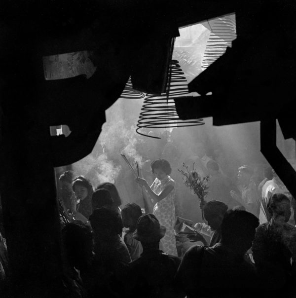 Time and Tide by Foo Tee Jun - Worshippers offer prayers at Tou Mu Kung Temple, c. 1960s