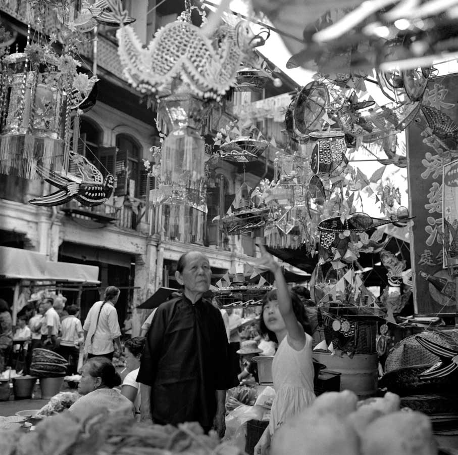 Time and Tide by Foo Tee Jun - Customers visit lantern shop at Chinatown, c. 1960s