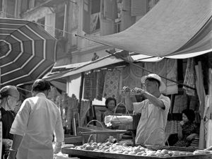 Time and Tide by Foo Tee Jun - Street hawkers peddle food at Chinatown, c. 1960s