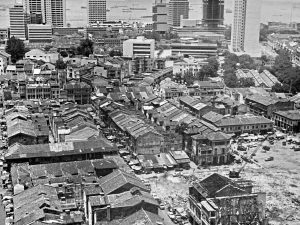 Time and Tide by Foo Tee Jun - View of shophouses being demolished in Chinatown, 1970s