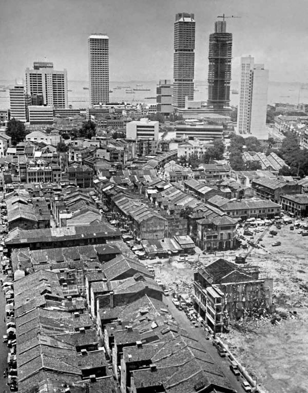Time and Tide by Foo Tee Jun - View of shophouses being demolished in Chinatown, 1970s