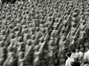 Time and Tide by Foo Tee Jun - Residents observe march-past as part of National Day celebrations, 1967