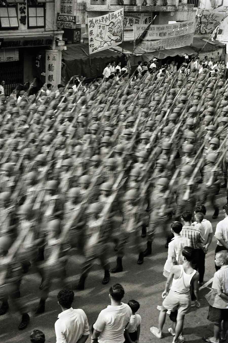 Time and Tide by Foo Tee Jun - Residents observe march-past as part of National Day celebrations, 1967