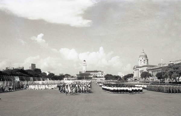 Time and Tide by Foo Tee Jun - National Day celebrations on Padang, c. 1960s