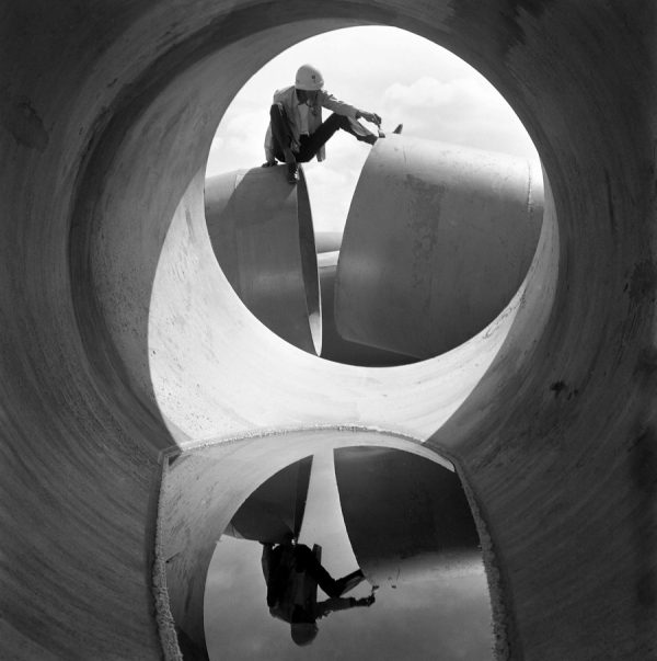 Time and Tide by Foo Tee Jun - Worker at construction site, c. 1960s