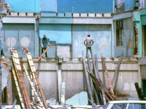 Time and Tide by Foo Tee Jun - Workers demolishing houses at Chinatown, c. 1960s