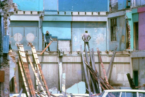 Time and Tide by Foo Tee Jun - Workers demolishing houses at Chinatown, c. 1960s