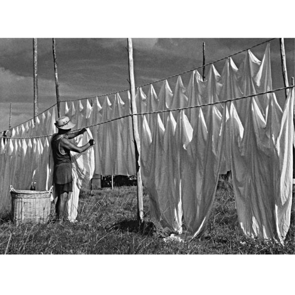 Passing Time by Lui Hock Seng - Indian laundry man hanging sheets, Upper Serangoon Road, c. 1960s - 1970s