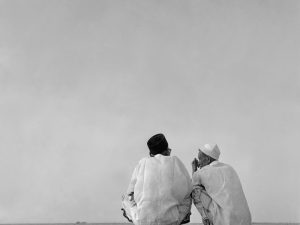 Passing Time by Lui Hock Seng - Morning Chat, Bedok Beach, c. 1960s – 1970s