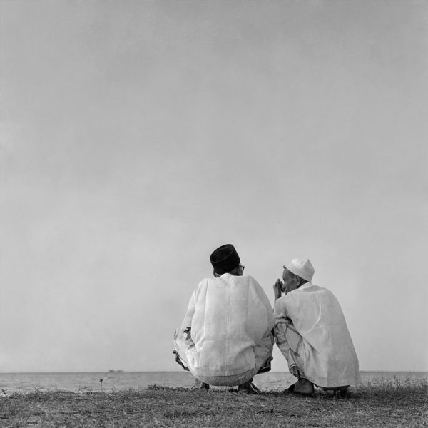Passing Time by Lui Hock Seng - Morning Chat, Bedok Beach, c. 1960s – 1970s