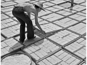Passing Time by Lui Hock Seng - Man drying noodles, c. 1960s – 1970s