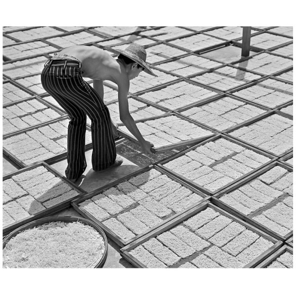 Passing Time by Lui Hock Seng - Man drying noodles, c. 1960s – 1970s