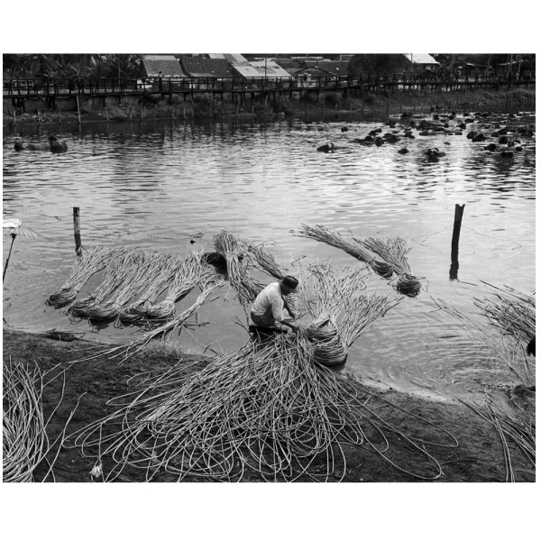 Passing Time by Lui Hock Seng - Man soaking rattan canes, Potong Pasir, c. 1960s – 1970s